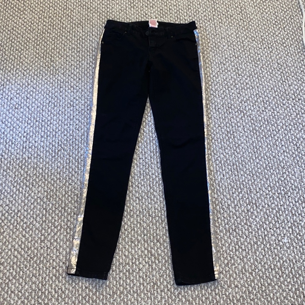 Black stretch skinny jeans with sequins lining detail. Size 5 juniors